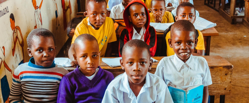 School children smiling during a school eye health initiative